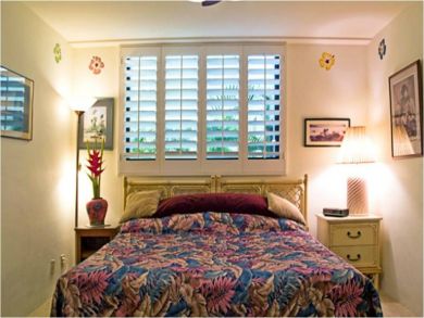 Second bedroom with twin beds made up as a king