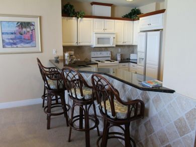 Breakfast bar seats three Breakfast bar seats three