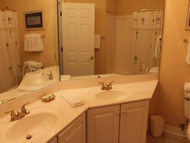 Third bathroom with shower over tub Third bathroom with shower over tub