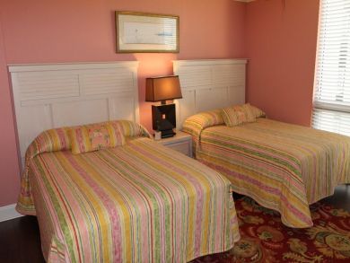 Bedroom 2 with queen beds Bedroom 2 with queen beds