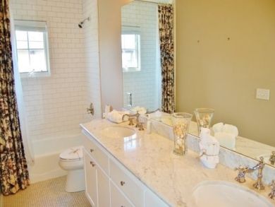 Bathroom with shower over tub Bathroom with shower over tub