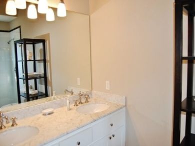 Bathroom with double vanity & walk-in shower Bathroom with double vanity & walk-in shower