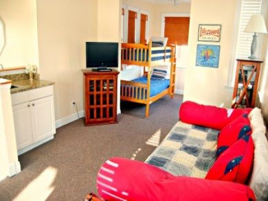 Tower room has day bed with trundle & one set of bunk beds
