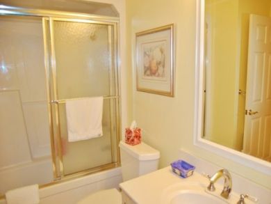 Bathroom with shower in tub Bathroom with shower in tub