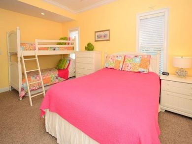 Bedroom 3 with queen bed & one set of bunk beds Bedroom 3 with queen bed & one set of bunk beds