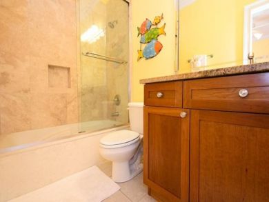 Bathroom with shower over tub Bathroom with shower over tub