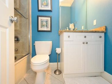 Bathroom with shower in tub Bathroom with shower in tub