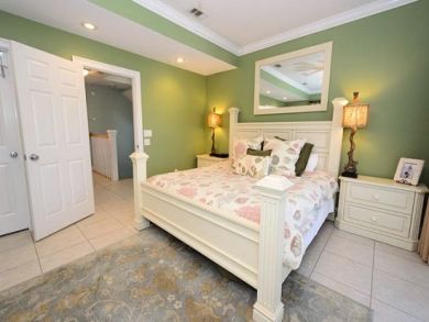 Master bedroom with king bed Master bedroom with king bed