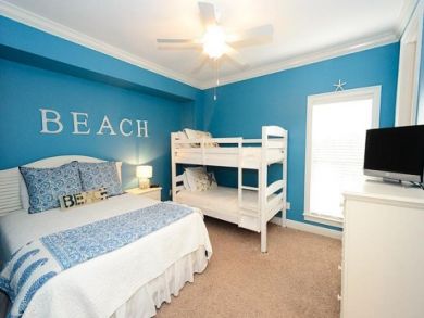 Bedroom 2 with queen bed & one set of bunk beds Bedroom 2 with queen bed & one set of bunk beds