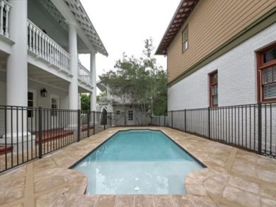 Fenced swimming pool