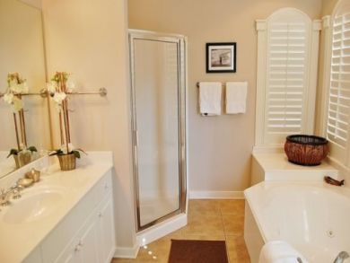 Bathroom with whirlpool tub & walk-in shower Bathroom with whirlpool tub & walk-in shower
