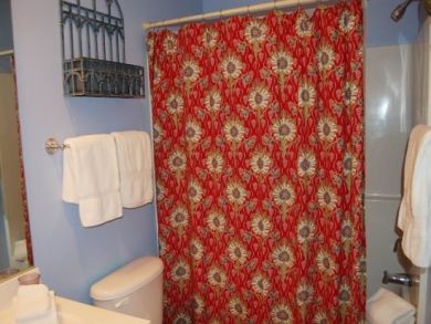Bathroom with shower in tub Bathroom with shower in tub