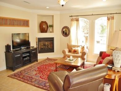 Flat screen TV & fireplace in living area Flat screen TV & fireplace in living area