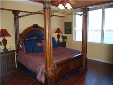Master bedroom with king bed Master bedroom with king bed