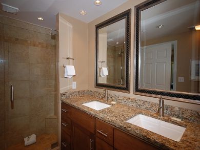 Master bathroom with dual vanity & walk-in shower Master bathroom with dual vanity & walk-in shower