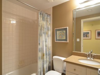 Bathroom with shower in tub Bathroom with shower in tub