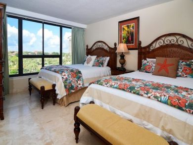 Bedroom 2 with queen beds Bedroom 2 with queen beds