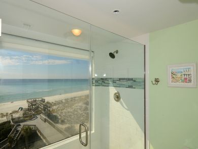 Master shower features a beautiful view of gulf Master shower features a beautiful view of gulf