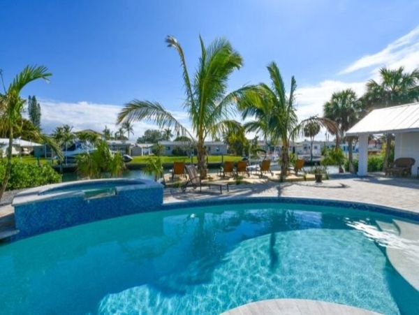 Holmes Beach Canal Front Home with Private Pool & Boat Dock
