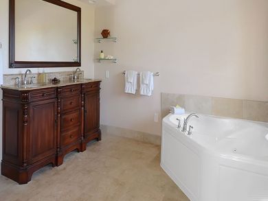 Master bathroom with whirlpool tub & walk-in shower Master bathroom with whirlpool tub & walk-in shower