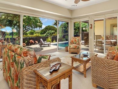 Spacious living room open to pool Spacious living room open to pool