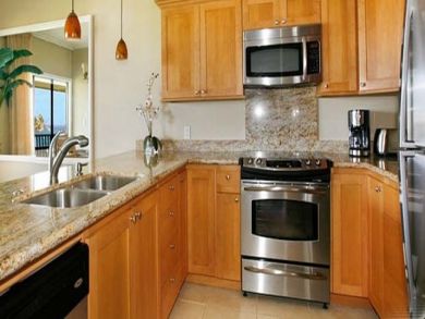 Fully equipped kitchen with stainless steel appliances