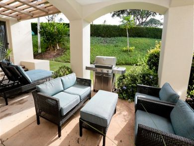 BBQ grill on furnished porch