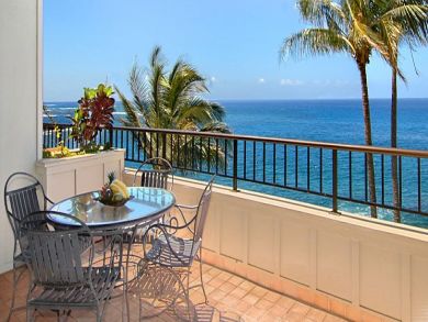 Ocean front balcony with table set
