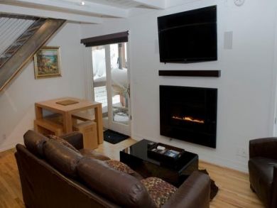 Living room with fireplace & flat screen TV