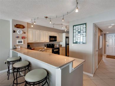 Well Equipped Kitchen with Bar Seating Well Equipped Kitchen with Bar Seating