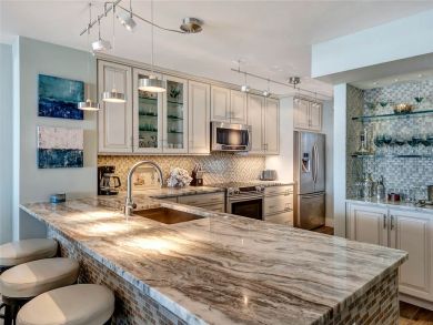 Fully Stocked Kitchen with Breakfast Bar