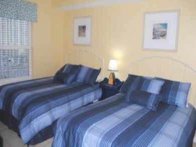Bedroom 2 with two full beds