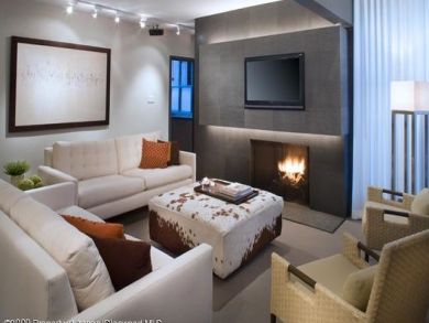 Fireplace & flat screen TV in living area