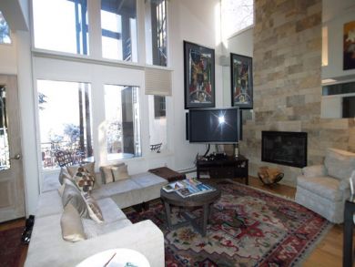 Living room with fireplace & flat screen TV