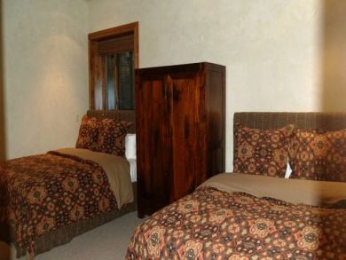 Bedroom 4 with two double beds