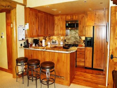 Gourmet kitchen with breakfast bar