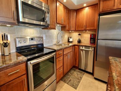 Fully equipped kitchen with stainless steel appliances