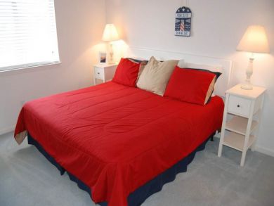 Master bedroom with king bed Master bedroom with king bed