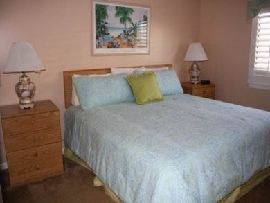 Master bedroom with king bed Master bedroom with king bed