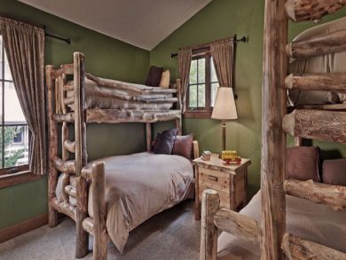 Two sets of bunk beds in second bedroom