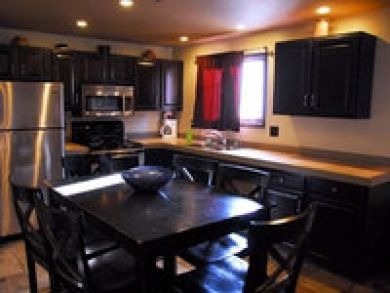 Fully equipped kitchen & dining area Fully equipped kitchen & dining area