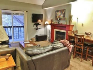 Fireplace & flat screen TV in living area Fireplace & flat screen TV in living area