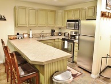 Fully equipped kitchen with breakfast bar Fully equipped kitchen with breakfast bar