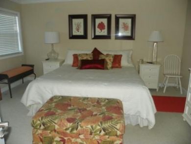 Master bedroom with king bed Master bedroom with king bed