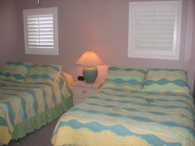 Bedroom 2 with two double beds