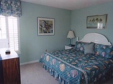 Master bedroom with king bed Master bedroom with king bed