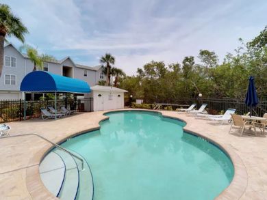 Close to beach condo with shared pool