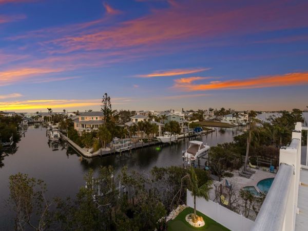 Luxury Canal-Front Vacation Rental Home on Anna Maria with Private Pool