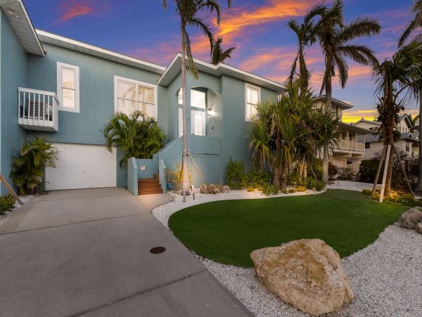 Luxury Canal-Front Vacation Rental Home on Anna Maria with Private Pool