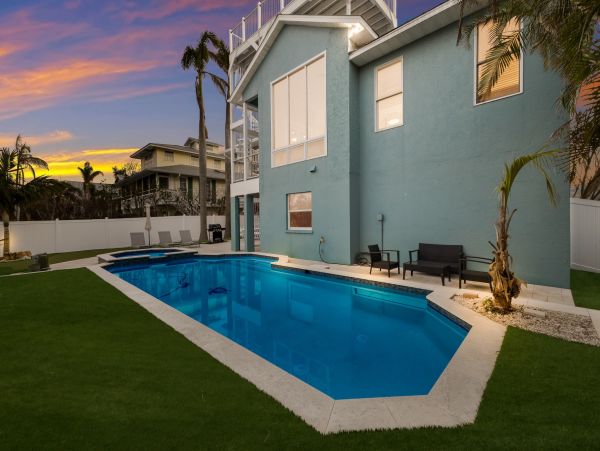 Luxury Canal-Front Vacation Rental Home on Anna Maria with Private Pool
